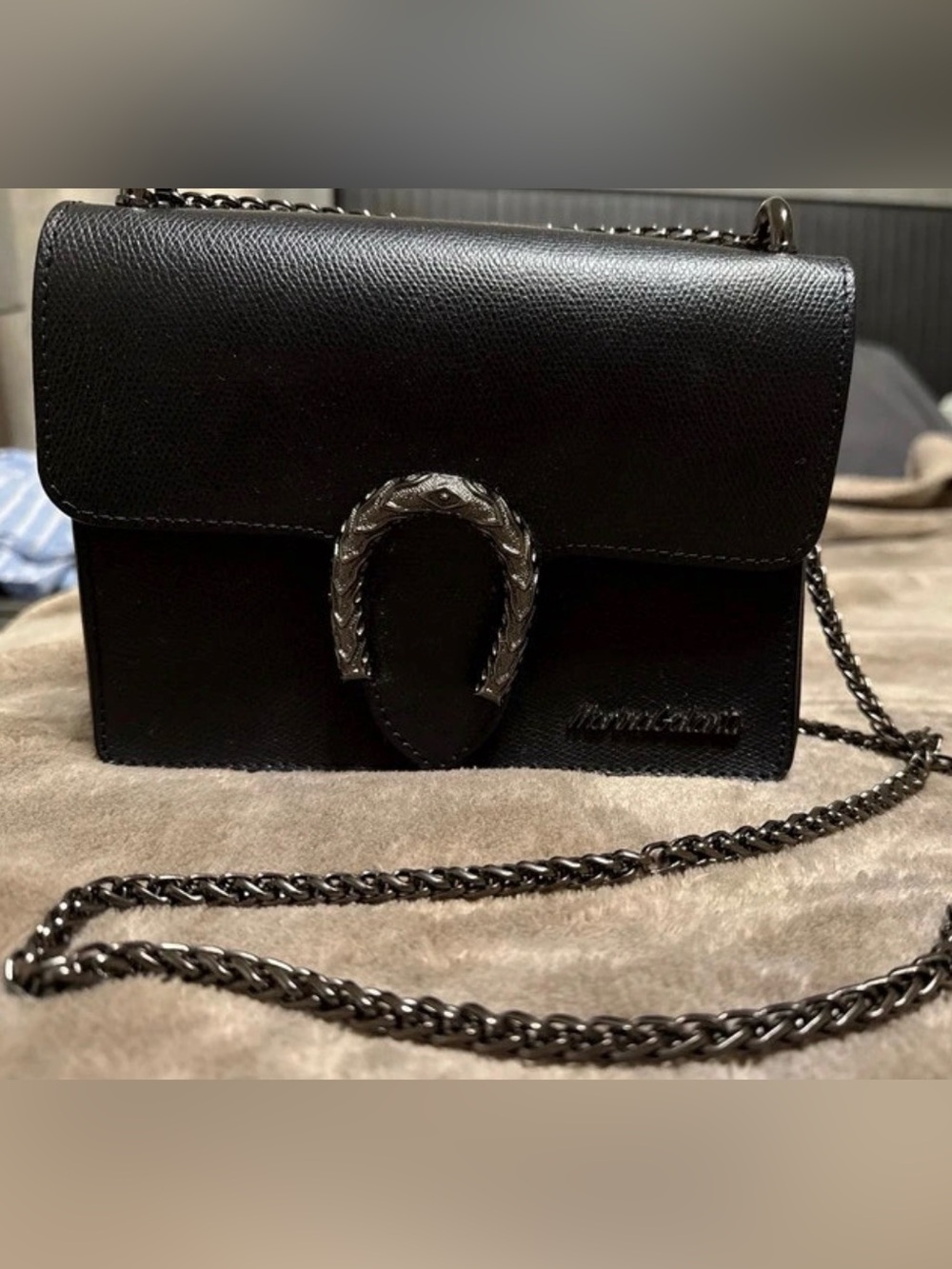 Black Leather Crossbody Bag with Decorative Gunmetal Horseshoe Accent
